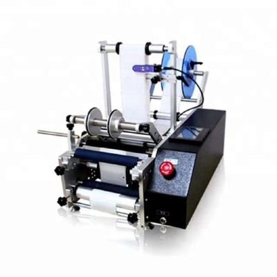 China semi automatic CLOTHING labeling machine round bottle paper sticker cheap price for sale