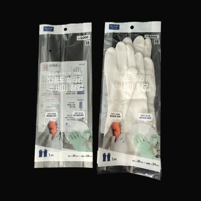 China Safety Transparent Three Sides Heat Seal Rubber Plastic Packaging Gloves Bags for sale