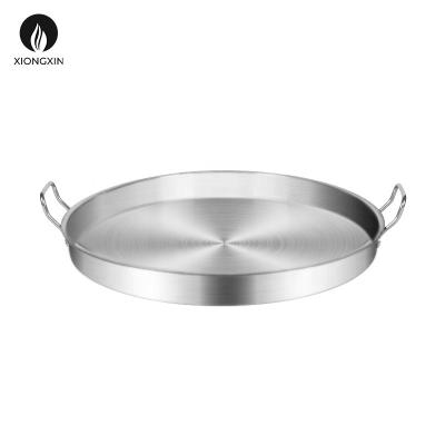 China Xiongxin High Capacity Stocked Paella Flat Bottom Pan for sale