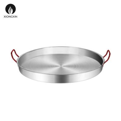 China Stocked Xiongxin Round Indoor And Outdoor Gas Frying Pan Flat Comals With Two Strong Handle for sale