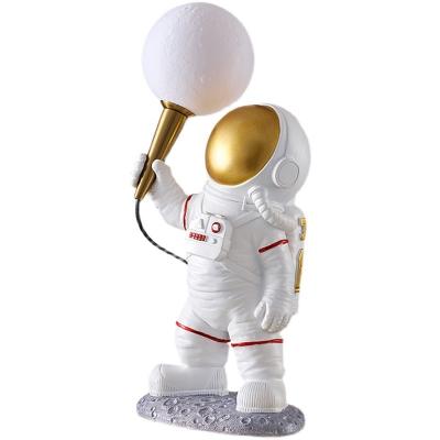 China New Design Resin Table Lamp Space Man Desk Light Creative Modern Hotel Bedroom Decorative Table Lamp for sale