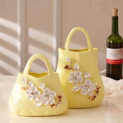 China Hot Sale Eco-friendly and Durable Delicate Handmade Ceramic Handbag Colorful Pieces for Hotel Living Room Home Decoration for sale