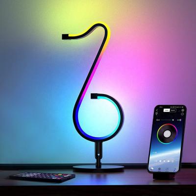 China APP Musical Note Desk Table Lamp Smart RGB Dimmable LED Tiktok Cool Wall Decor Night Light with Remote Control for Gift Present for sale