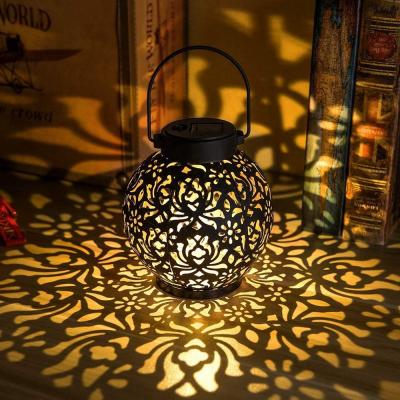 China Metal hanging Leaf-shadow handle lantern lamp waterproof solar outdoor lighting patio decoration lights for sale