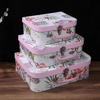 China Decorative Pink Custom Made Handmade Small Mini Children Paper Cardboard Suitcase Toy Gift Boxes With Handle for sale