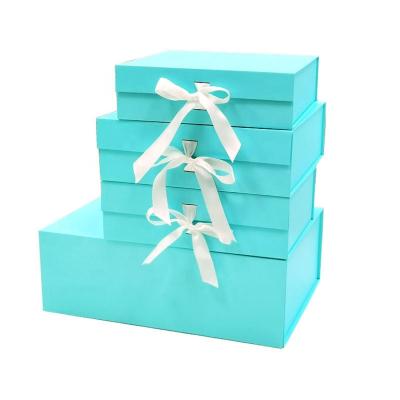 China Brand Folding Apparel Flat Pack Hoodie Handmade Custom Printed Packaging Gift Box With Ribbon Closure for sale