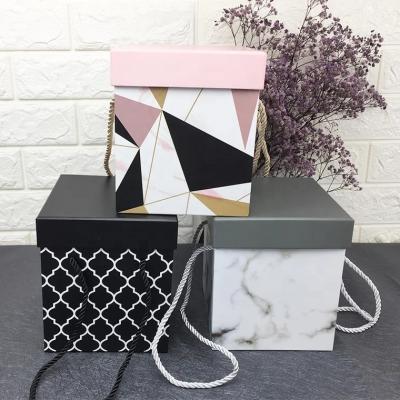 China Handmade Custom Logo High Quality Marble Pattern Square Gift Box Valentines Day Flower Packaging With Handle for sale