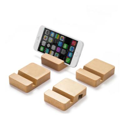 China Custom Logo Eco-Friendly Universal Super Stand Desktop Quality Mobile Phone Stand Wooden Cell Phone Stand for sale