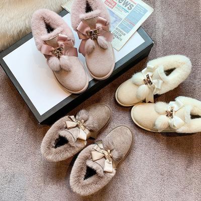 China Curvy Women Bows Balls Boots Lace Cute Female Winter Shoes New Arrivals 2020 Luxury Furry Waterproof Women Snow Boots for sale