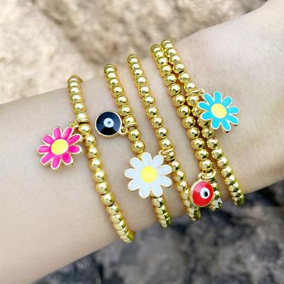 China Bohemia FASHIONABLE European Enamel Daisy Flower Charm Bracelet Turkish Eye Colorful Gold Plated Brass Beads Elastic Bracelet for sale