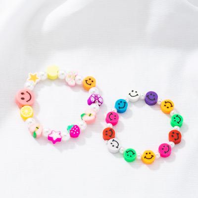 China Wholesale FASHIONABLE Smile Face Fruit and Butterfly Plastic Beads Charm Bracelet Colorful Beaded Bracelet for Women for sale