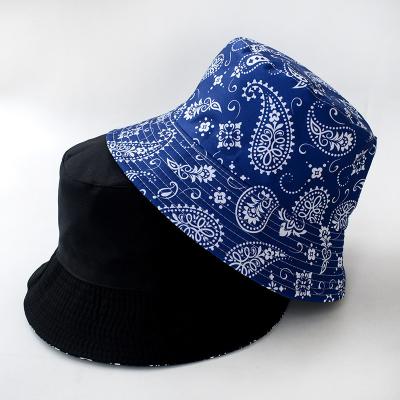 China Male summer fashion cashew print fisherman all-match sun protection sun visor hat female double-sided hat for sale