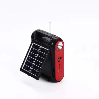 China SUNWELL Residential Solar Powered Lantern with FM Radio Hanging Led Solar Torch with Cell Phone Charger as Torch for sale