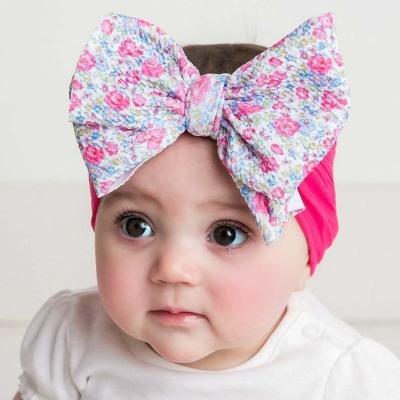 China Custom popular flower print hair accessories soft stretchy nylon knot baby bows kids turban headbands for sale