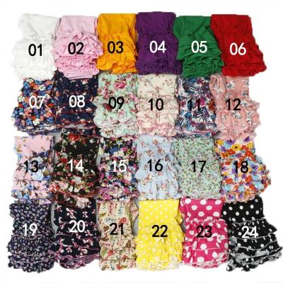 China Anti-wrinkle girls clothing pink colorful flower toddler ruffled leggings triple ruffles kids pants glazing ruffle baby pants for sale