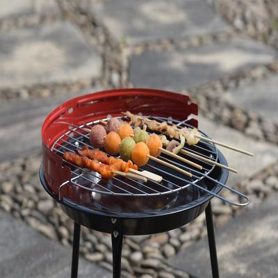 China Easily Assembled Outdoor Tiny Charcoal BBQ Grills Wood Biomass Pellet Chips Stove Picnic Grill for sale