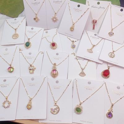 China FASHION Mixed Bulk Gold Plated Crystal Zircon Pendant Fashion Simple Color Keeping Pendant Necklace Random Shipping for sale