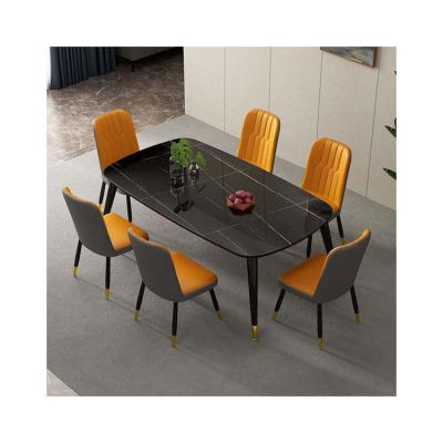 China Modern Minimalist Glass Dining Table Rock Panel Dining Table And Chair for sale