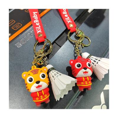 China Soft rubber Wholesale Creative Badminton Key Chain Sports Souvenir Keychain With Rubber Tiger Dolls for sale