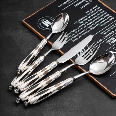 China Wholesale Viable Vintage Wedding Porcelain Handle Forge Steak Knife Dinner Fork Spoon Flatware Stainless Steel Flatware Sets for sale