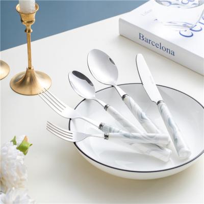 China Viable High Quality Restaurant Handle Silverware Spoon Knife Fork Exquisite Ceramic Cutlery Set Stainless Steel Cutlery Set for sale