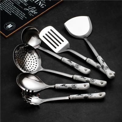 China Sustainable Kitchen Supplies Restaurant Hotel Ceramic Handle Home Kitchen Cares Set Cooking Tools Kitchen Utensils for sale