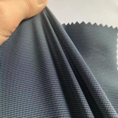 China Nylon Spandex Weft Stretch Downproof 70D 140gsm Ripstop Polyester Blend Dye Fabric With PU5k/5k Coated For Outdoor Sportswear for sale