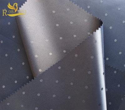 China 75D*150D 93gsm anti-static waterproof PU coated 100% polyester satin jacquard lining fabric for handbag for sale