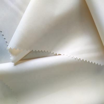 China Antistatic Home Textile Down Proof 75D 77gsm Plain Polyester Peach Finish 100% Hotel Bedding Fabric for sale