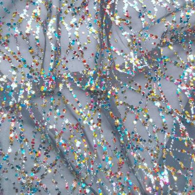 China New Design Waterproof Glitter Sequin Stretch Mesh Fabric Dress And Dance Solid Glitter Sequin Fabric For Ladies And Kids for sale