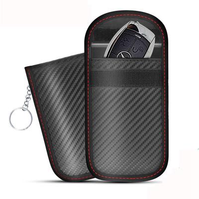 China Fashion Customize Car Key Case Men Antimagnetic Carbon Fiber Universal Leather Key Case Rfid Blocking Multifunctional Car Key Pocket for sale