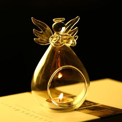 China Luxury Creative Tea Light Modern Angel Candle Holders Wedding Decorating Glass Candle Holder for sale