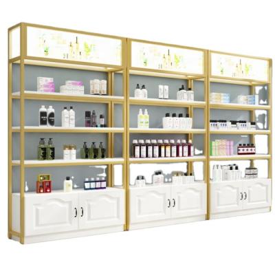 China Modern cosmetic display cabinet salon beauty shop maternal and child products sample iron wooden display cosmetic display cabinet for sale