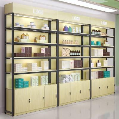 China Factory Modern Wall Display Stand Retail Store Customized Furniture for Cosmetic Display Cabinet and Showca for sale