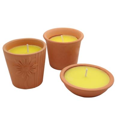 China Citronella scented custom luxury outdoor candles in natural terracotta pot mosquito repellent for sale