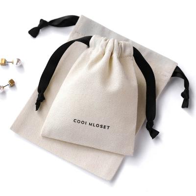 China Durable 8*10 Cm Cotton Canvas Drawstring Pouch Beige Medium Gift Jewelry Packaging Bags for sale