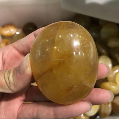 China China Wholesale high quality polished golden healer palm stone natural palm stone crystals folk crafts for decoration for sale