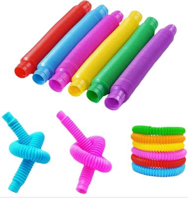 China Eco-Friendly Material Sensory Relief Tool Wholesale Color Sensory Stress Tube Toys Children Stretching Tube for sale