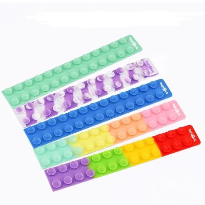 China New Eco-friendly Material Bubble Squid Sucker Silicone Decompression Sucker Fingertip Fun Toys for sale