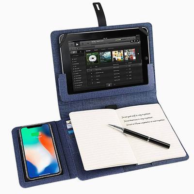 China Magnetic Smart leather buckle notebook with wireless charging tablet support and USB pen holder for sale