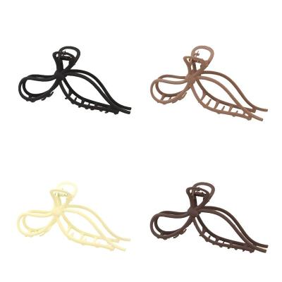 China Advanced Women Girls Hair Accessories Butterfly Shark Clip Frosted Hollow Out Metal Bow Knot Grab Clip Style Shark Clip Headwear for sale