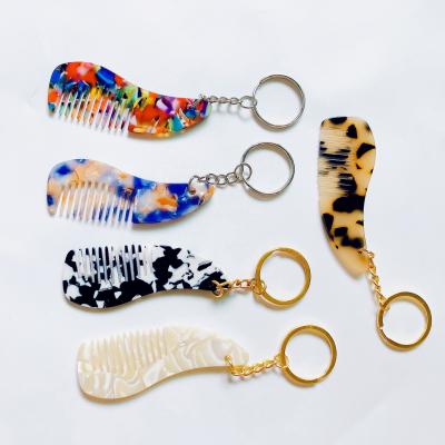 China Mini Travel Portable Cute Colorful Tortoise Women Kids Home Portable Shell Marble Acetate Mini Pocket Hair Pendant Chain Hair Combs for sale