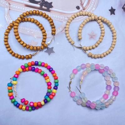 China 2022 TRENDY wholesale unique color beaded oversized wooden pearl earrings circle earring dangle earrings for sale