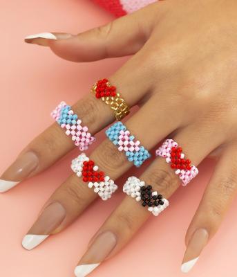 China SY CLASSIC Simple Fashion Beaded Colorful Heart Ring Woven Hollow Geometric Adjustable Elastic Bead Ring Jewelry Women's for sale