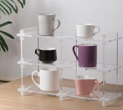 China Xinkeda Adjustable Multifunctional Foldable Display Storage Shelf Clear Acrylic Rack for sale