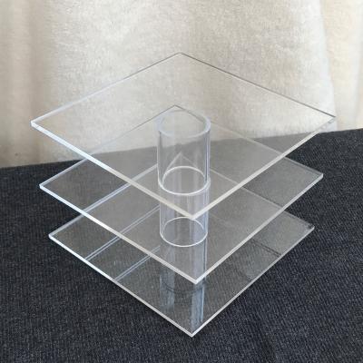 China Xinkeda Deployment Rotating Acrylic Display Stand For Rubik's Cube Cake for sale