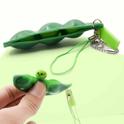 China Eco-friendly Decompression Colorful Relaxing Product Squeezed Bean Vent Toy Soybean Keychain Anti Stressest Christmas Gifts for sale