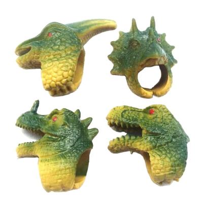 China Non-Toxic TPR Dinosaur Finger Ring Decompression Duct Squeeze Toy for Kids Pretend Party for sale