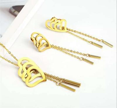 China FASHIONABLE Wholesale Gold Plated Heart Shape Tassel Necklace Earrings Stainless Steel Jewelry Set For Women for sale