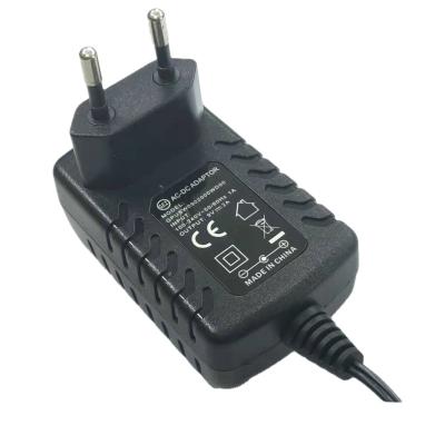 China Convenient 9V 2A 18W Battery Charger With UK/US/EU Plug Customized Adapter Charger for sale